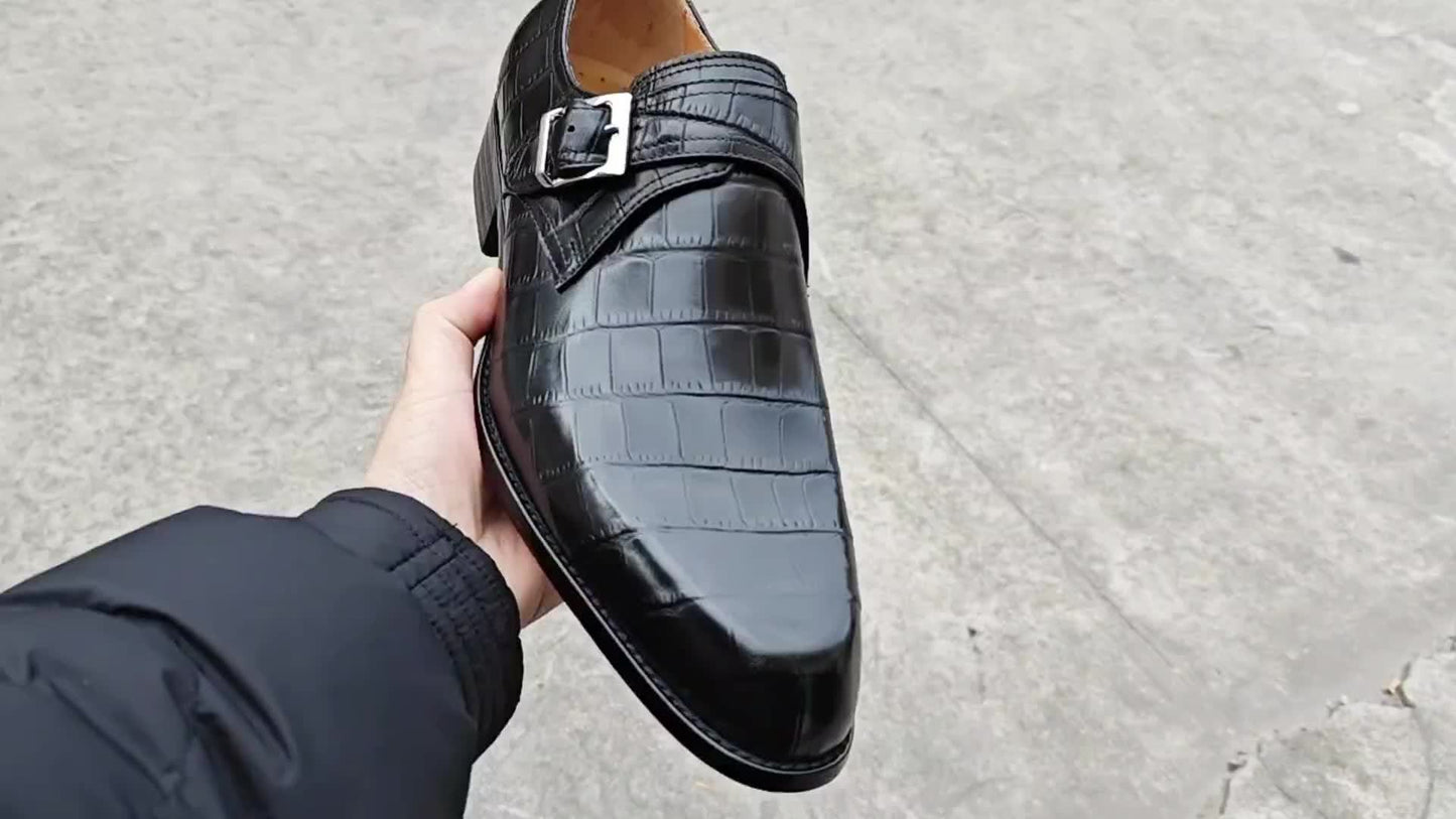 Pair of Black Men's Monk Strap Loafers with a genuine cow leather upper and a stylish single silver or gold-toned buckle.