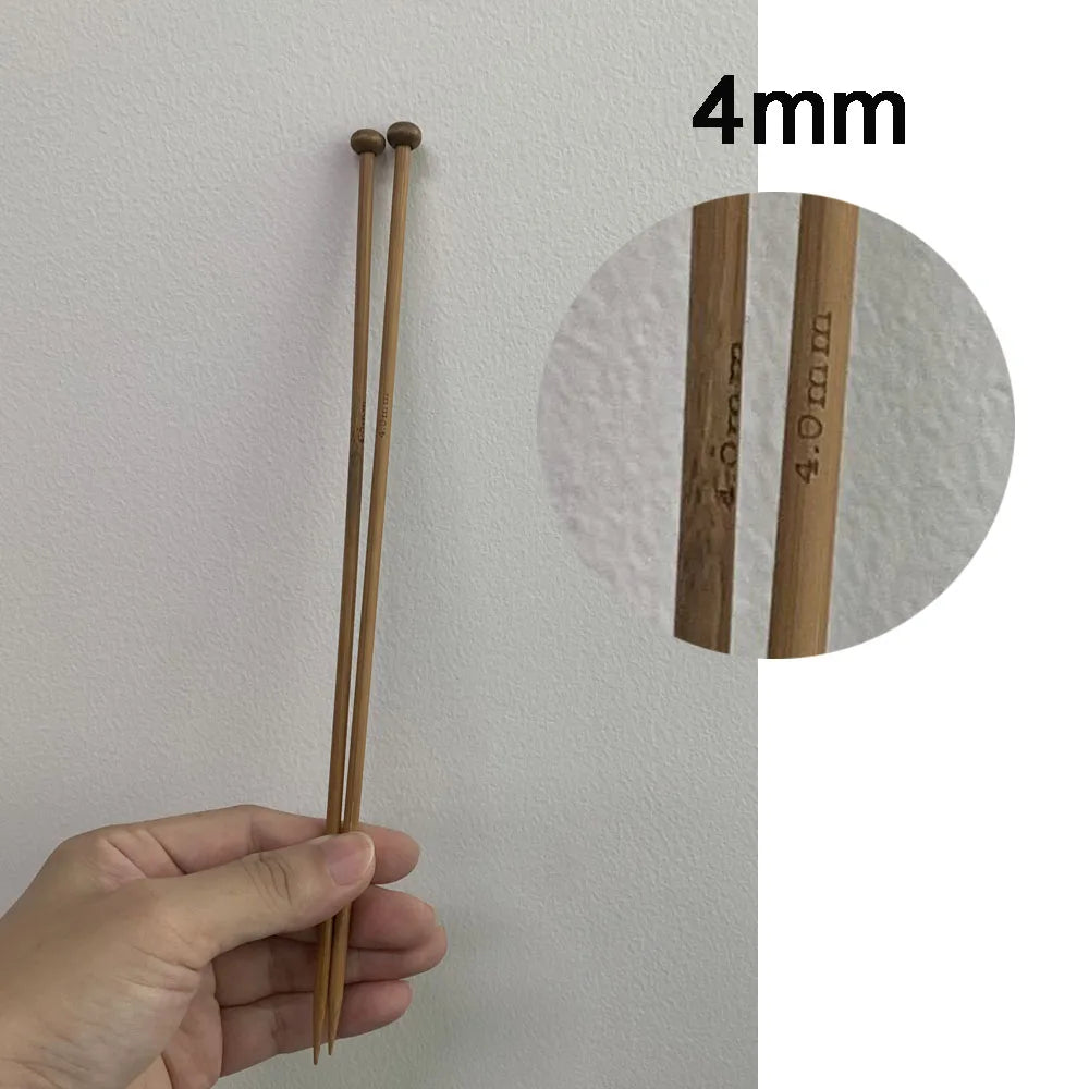 Set of smooth, carbonized bamboo knitting needles in various sizes, from 3mm to 10mm. The 35cm long needles are shown in a bundle and being used by a woman knitting a red garment.