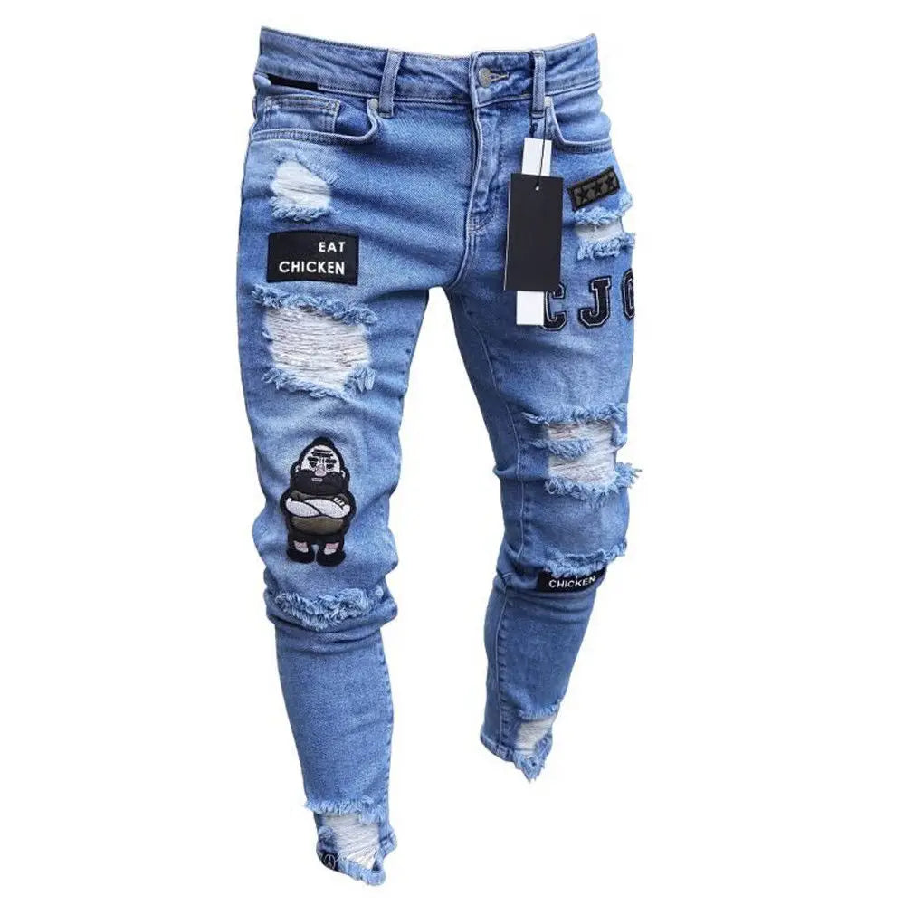 Ripped blue jeans with patches and branding on a white background