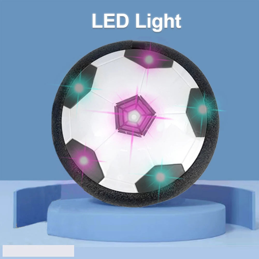 Soccer ball with LED lights on a blue platform and background. LED hover soccer ball toy, safe electric floating football for kids. Music, unisex, gift idea, indoor/outdoor, UK delivery ftf fashion.
