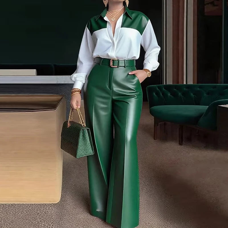 Person wearing a green and white outfit with a matching handbag in an indoor setting.