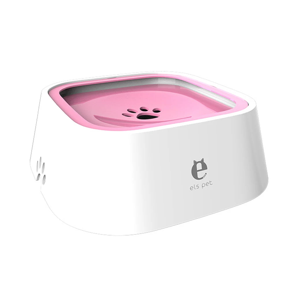 Pet water fountain with pink top and white base on a white background