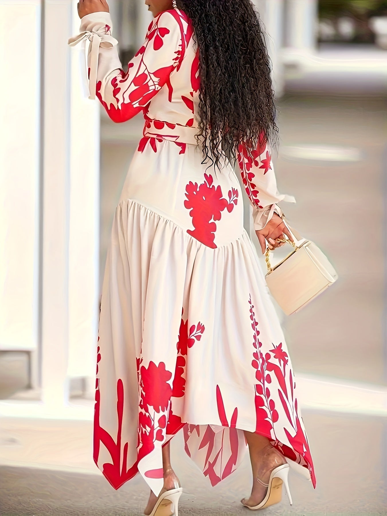 Elegant plus size ruched dress with a belted waist and allover floral print, made from a woven, non-stretch fabric.