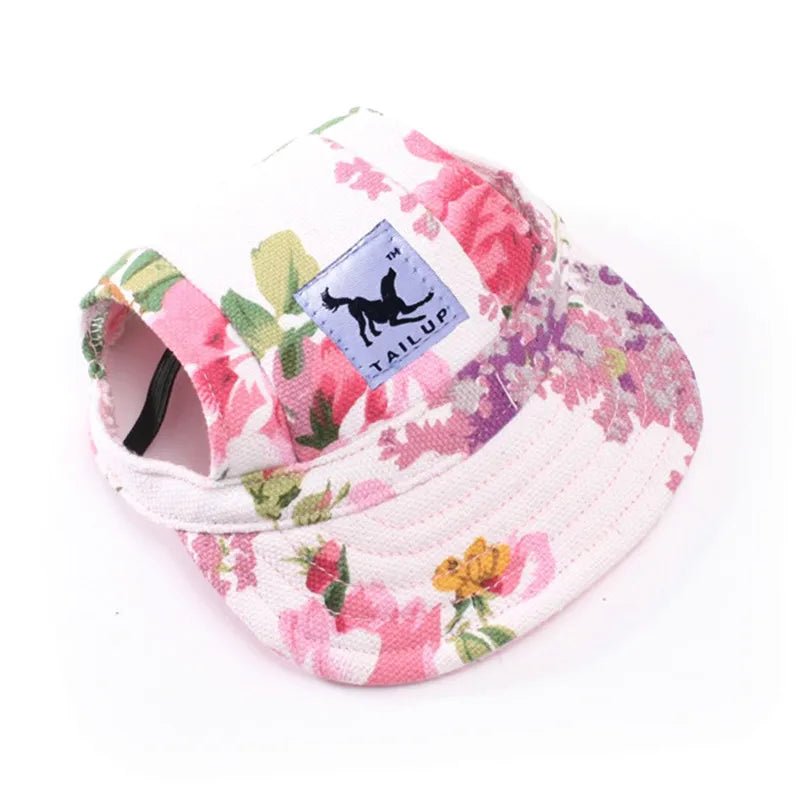 Floral visor with a visible brand logo on a white background. Breathable canvas dog baseball hat with ear holes and adjustable strap UK.