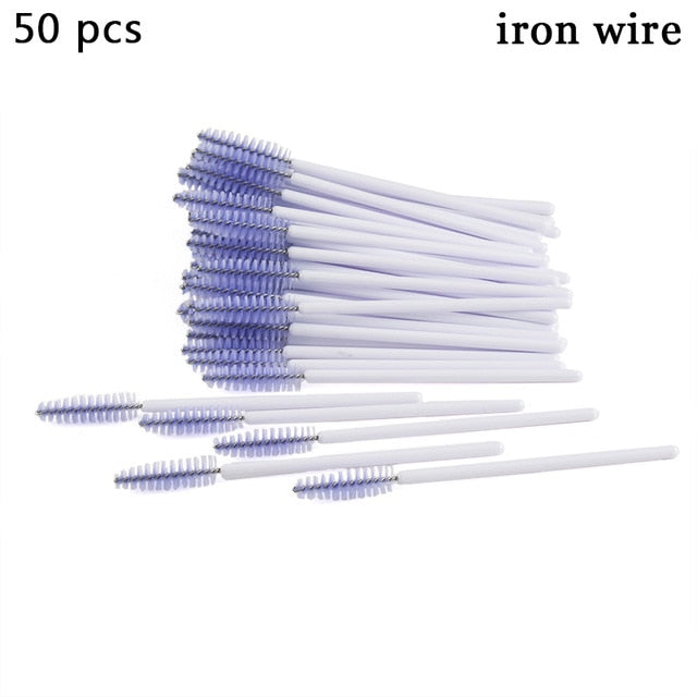 A collection of disposable eyelash brushes in various colors including .