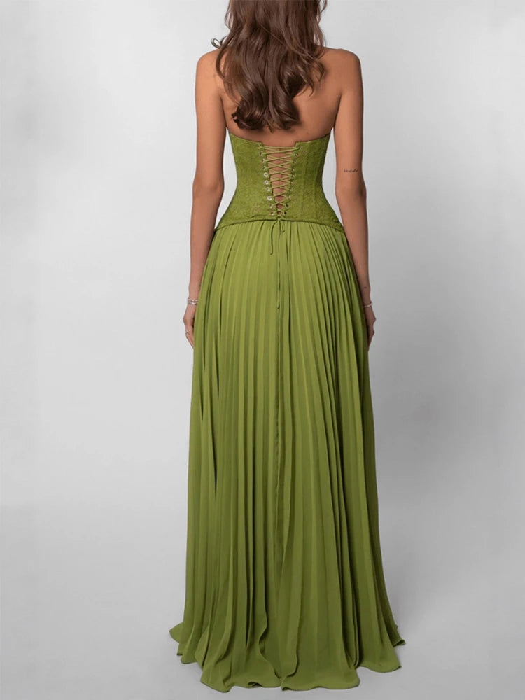 Green strapless gown with a lace-up back on a white background