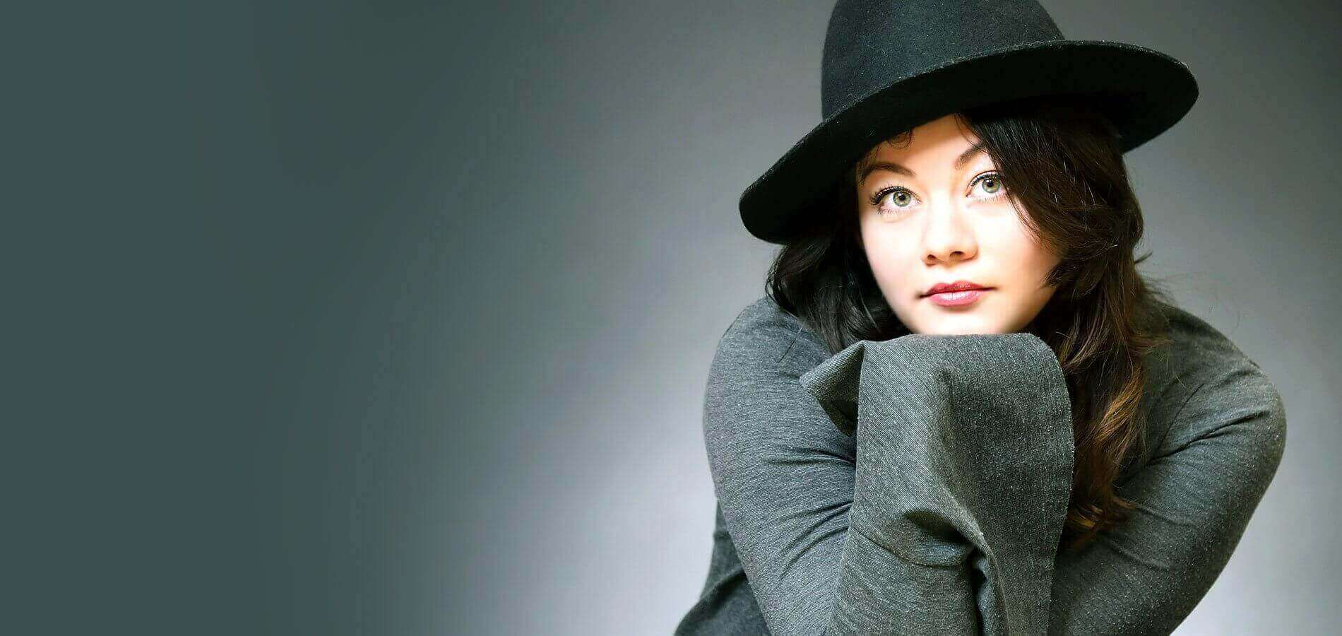 Elegant woman in black fedora hat and grey coat - Premium women's fashion at FTF Market UK