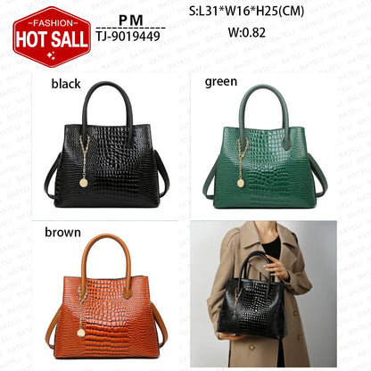 Three handbags in black, green, and brown with a person holding a black bag in a coat. Large capacity portable women’s crossbody bag with soft handle, zipper closure, chain accents, solid color print, perfect for daily fashion.