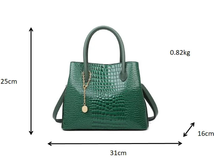 Green handbag with measurements on a white background. Large capacity portable women’s crossbody bag with soft handle, zipper closure, chain accents, solid color print, perfect for daily fashion.