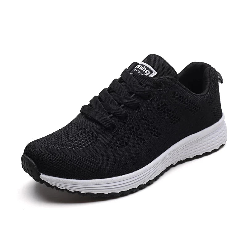 Black running shoe with white sole on a white background