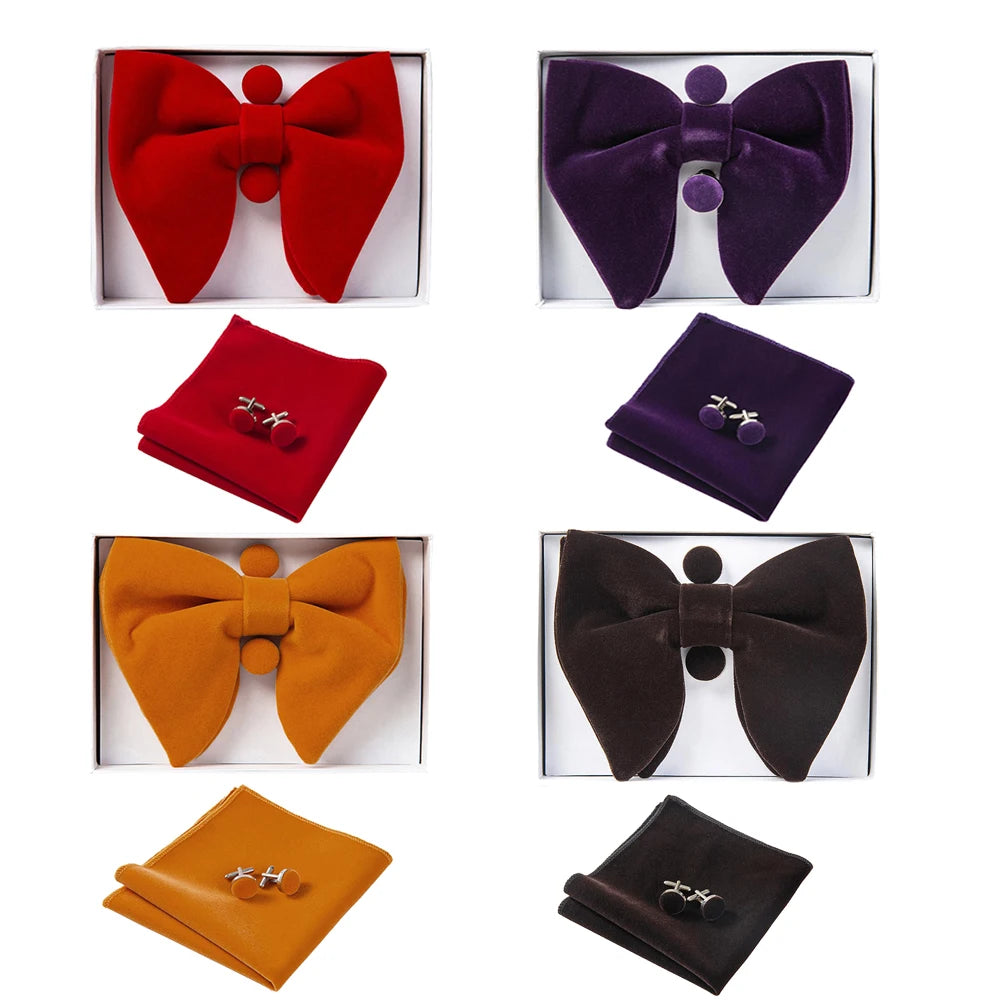 Set of four bow ties and pocket squares in red, purple, orange, and black with matching cufflinks on a white background.