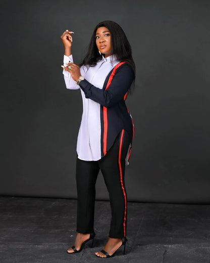 Woman wearing a black and red outfit with a white shirt against a dark background. Women’s stripe print long sleeve blouse and regular high waist pants set. Office lady outfit, comfortable, elegant, solid workwear for spring/autumn.