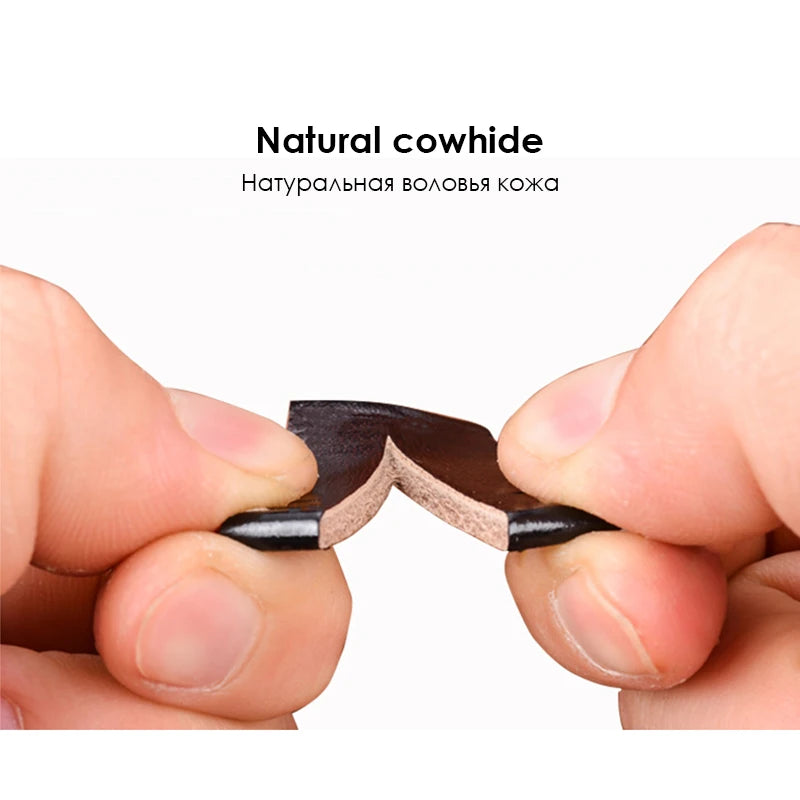Two hands holding a piece of natural cowhide leather against a white background.