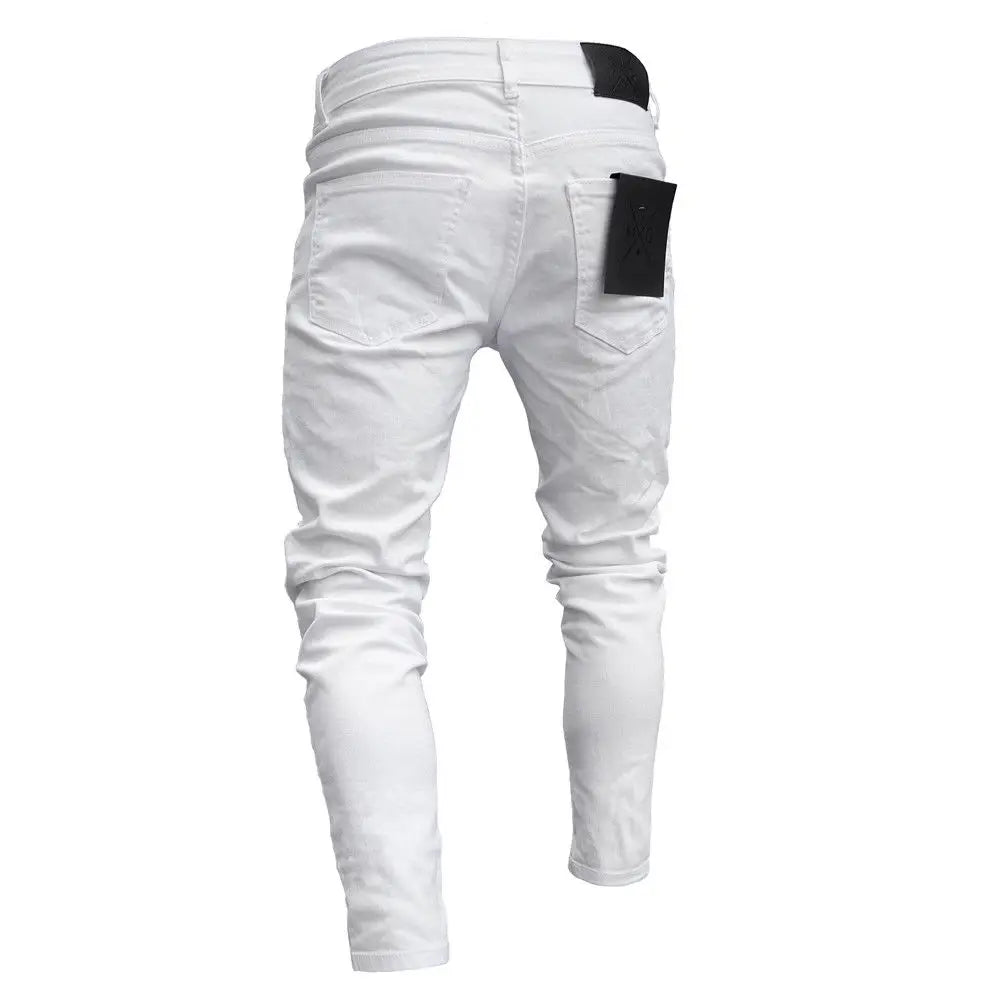 White pants with black patches on a white background