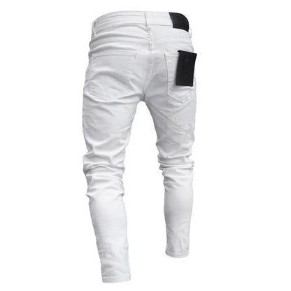 White pants with black patches on a white background