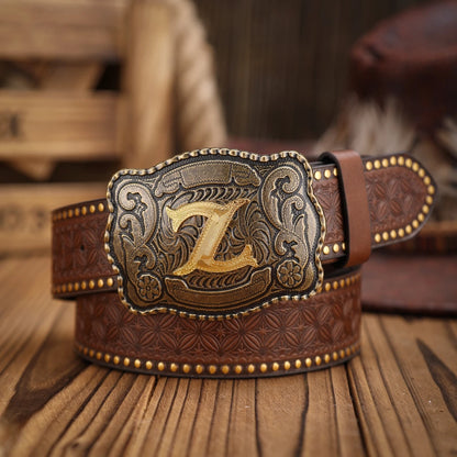 Brown leather belt with decorative buckle on a wooden surface