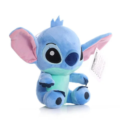 Plush toy resembling a character with blue and pink colors on a white background