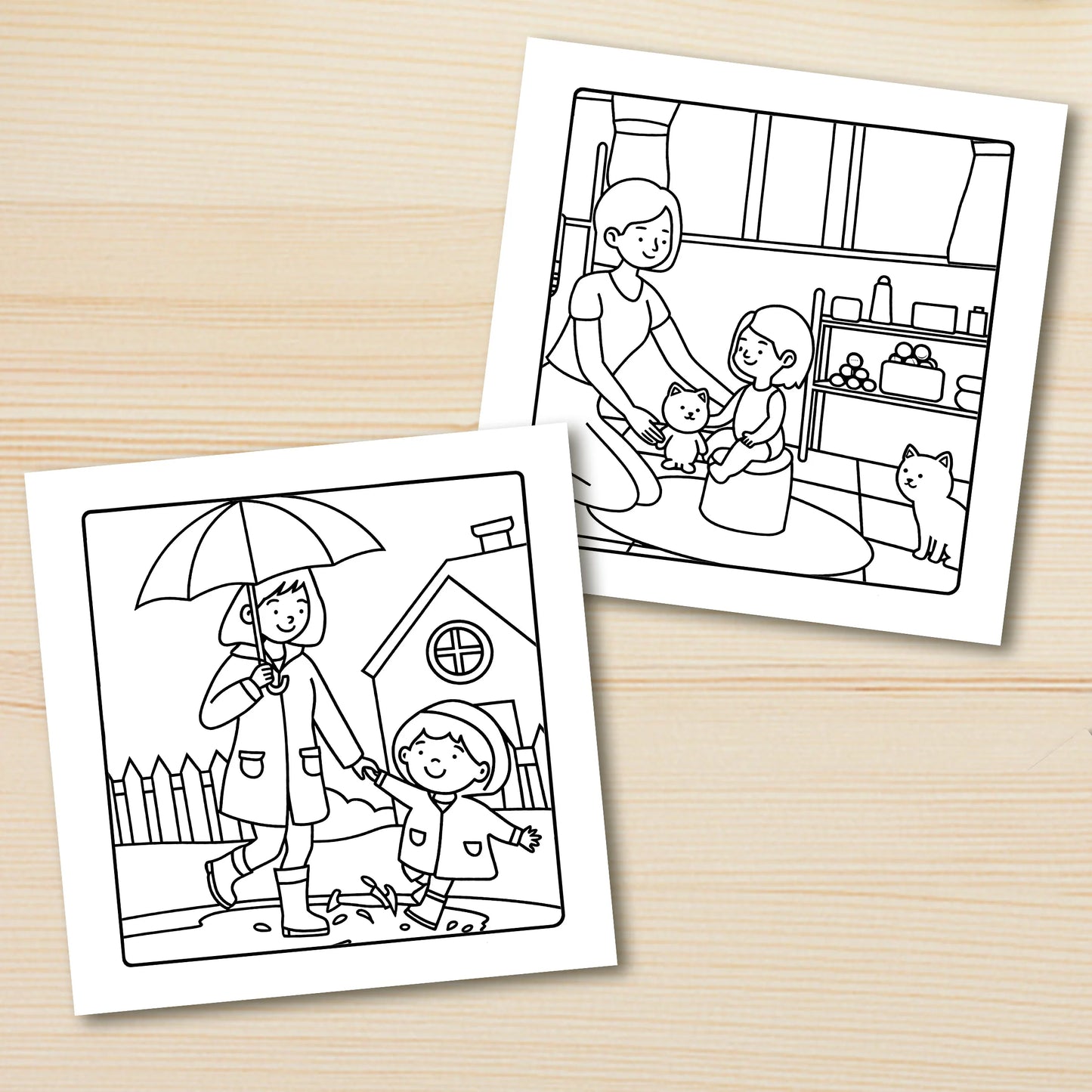 Two coloring pages on a wooden surface, one with a child and umbrella, the other with a family scene. Adult coloring book titled MOM MOMENTS featuring cozy daily scenes for relaxation, cute mindful activities, FTF Fashion UK.