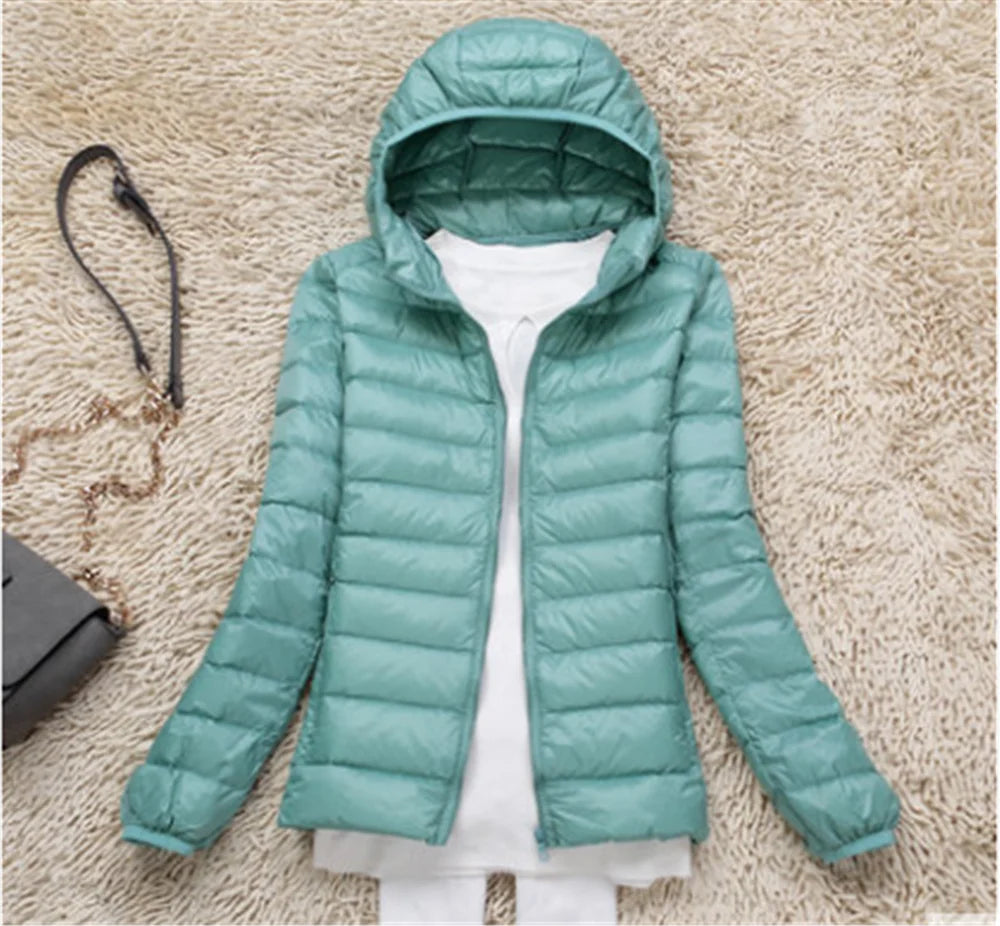 Women's ultra-lightweight hooded puffer jacket in multiple colors and extended sizes