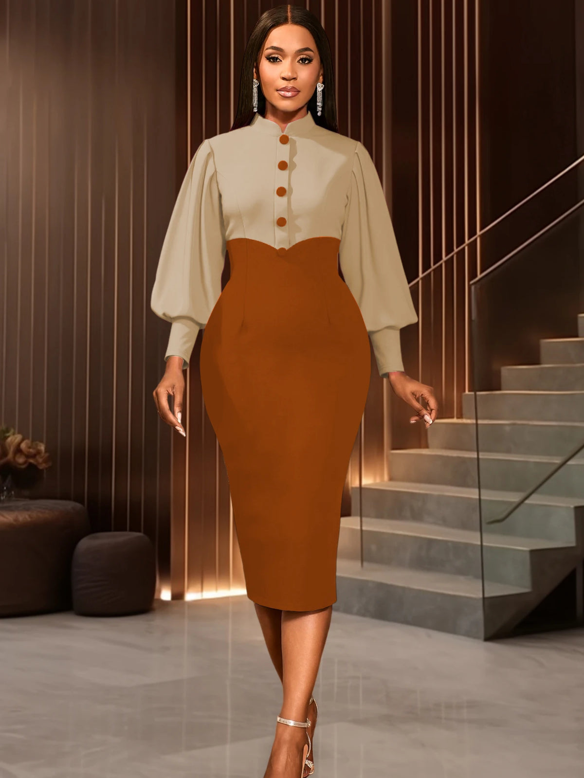 Woman in a beige blouse with brown skirt walking in a modern interior setting