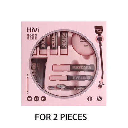 Pink makeup set packaging with Hivi branding and illustrations of makeup items. HiVi makeup gift box with limited edition lipstick, setting powder, and eyeliner. Perfect romantic gift for women. Safe, elegant, lasting wear.