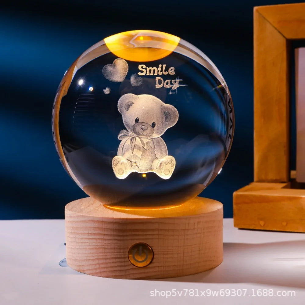 A 3D Axolotl laser engraved inside a crystal ball with a LED base, projecting colors to create a vibrant appearance. 3D laser engraved axolotl crystal ball lamp with USB LED base, vibrant colours UK.