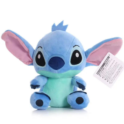 Plush toy resembling a character with a blue body and pink ears on a white background