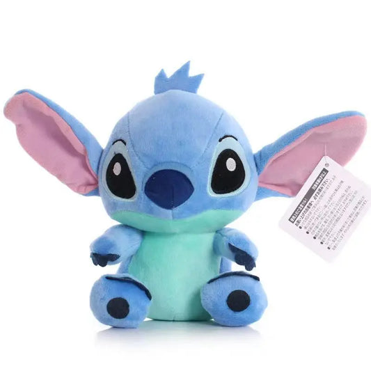 Plush toy resembling a character with a blue body and pink ears on a white background