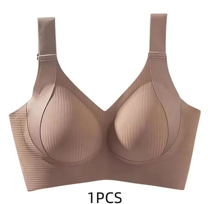 A single-piece wireless bra in a light nude beige color, featuring ribbed cups and a wide underband, shown against a plain white background with '1PCS' text below.