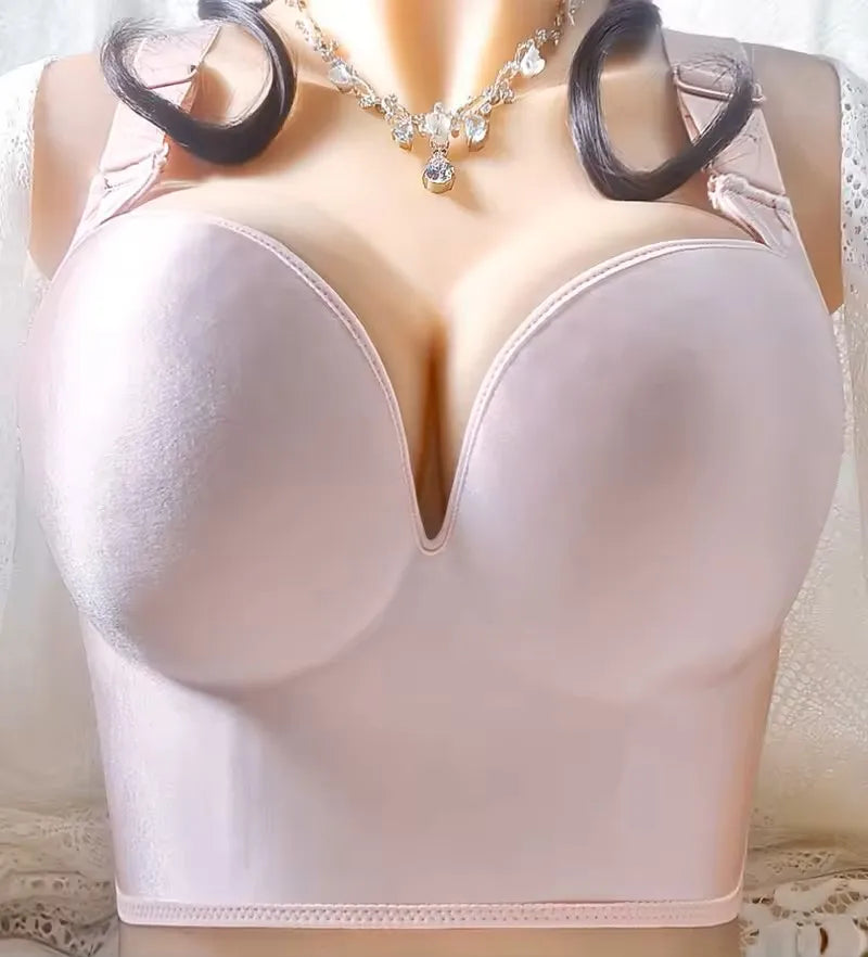 Pink wireless push-up bra front close-up showing full cup shape and V-neckline on mannequin