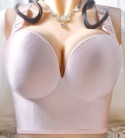 Pink wireless push-up bra front close-up showing full cup shape and V-neckline on mannequin