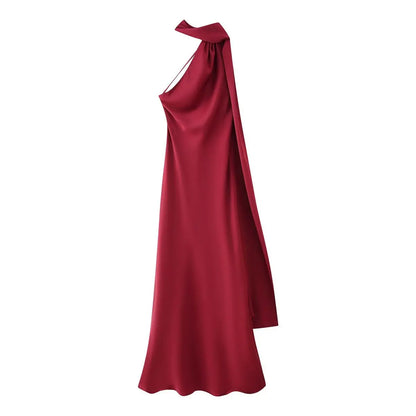 Red one-shoulder evening gown on a white background
