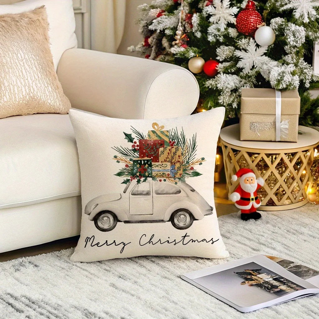 Decorative pillow with Christmas design on a couch in front of a decorated tree. Car Christmas pillowcase, festive cushion cover, Merry Christmas print. Soft peachskin, sofa/bed decor. Holiday home accent UK.
