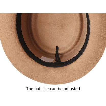 Close-up of a beige hat with a black band on a white background. Fedora hat polyester unisex carnival mask, gentleman style, costume accessory, roll trim hat for party and carnival events.