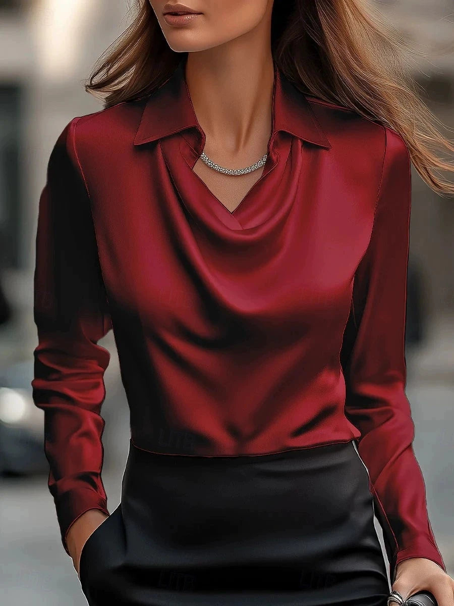 Red blouse worn by a person with a blurred background