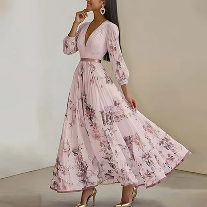 Woman wearing a pink floral dress against a neutral background