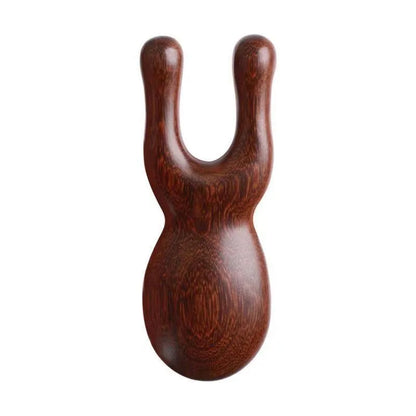 Wooden slingshot on a white background