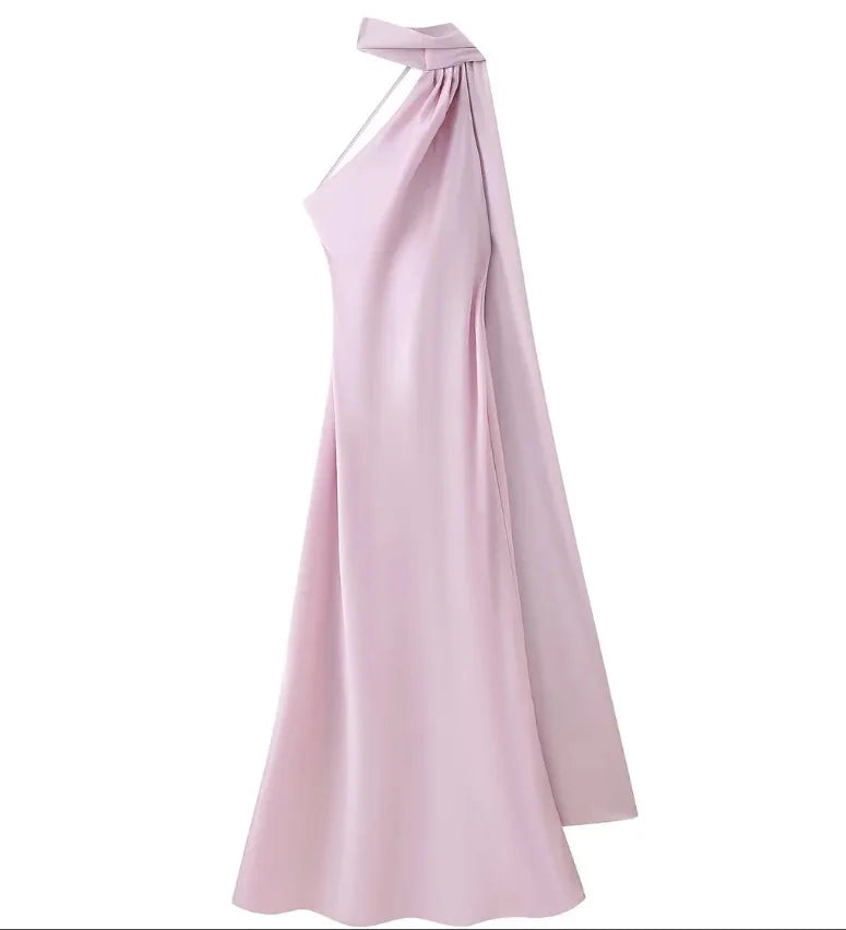 Pink one-shoulder evening gown on a white background