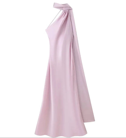Pink one-shoulder evening gown on a white background