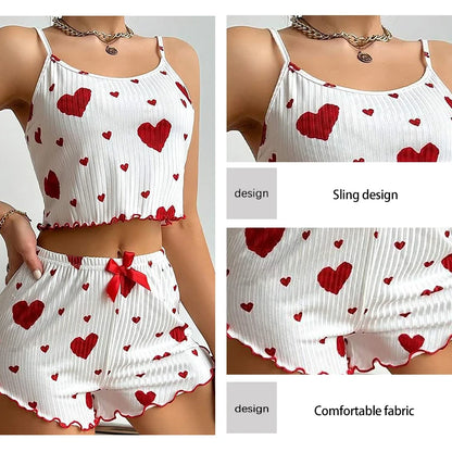 White top and shorts set with red heart patterns, featuring 'sling design' and 'comfortable fabric' text. Soft women’s pajama set, 2 pieces white tank top and shorts, breathable fabric with love print, comfortable casual sleepwear, UK FTF Market.