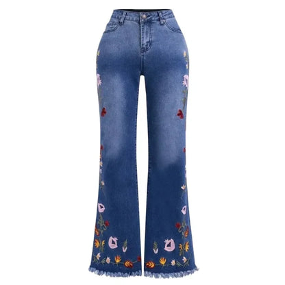 Blue jeans with floral embroidery on a white background