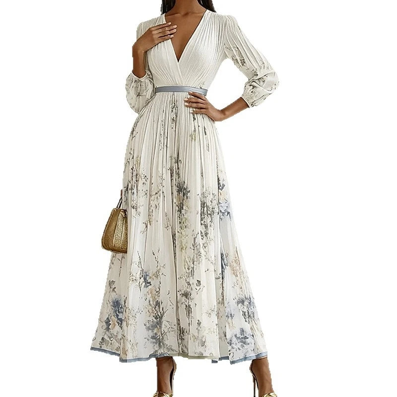 Woman wearing a floral dress with long sleeves on a white background