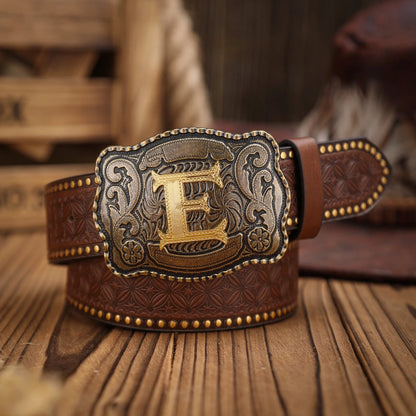 Brown leather belt with a decorative buckle on a wooden surface