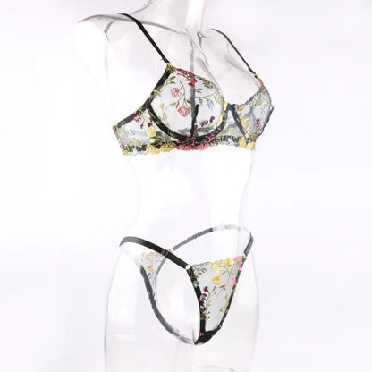 Floral lingerie set on a mannequin against a white background