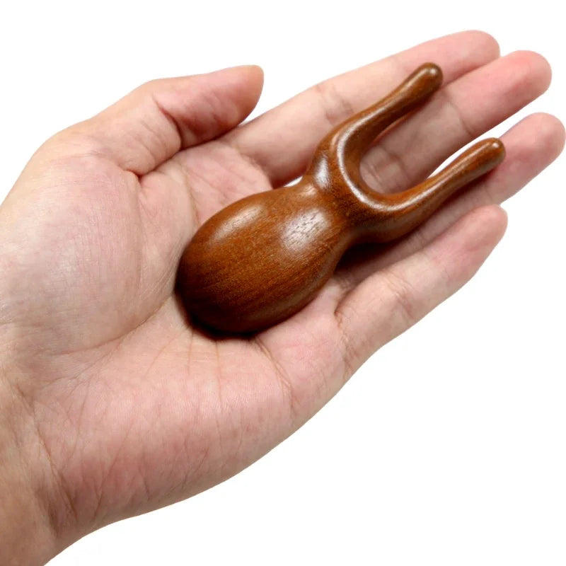 Sandalwood Gua Sha Tool Close-Up – Smooth Polished Wood Ergonomic Grip Face Massager