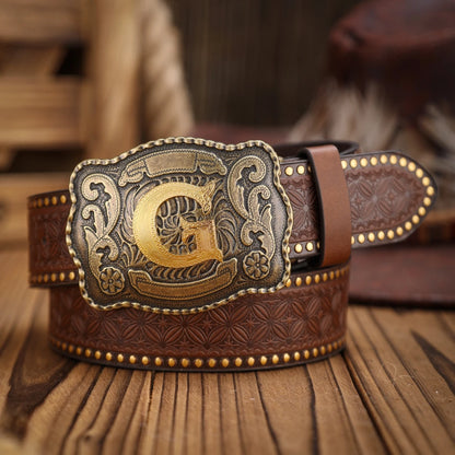 Brown leather belt with a gold and silver buckle on a wooden surface