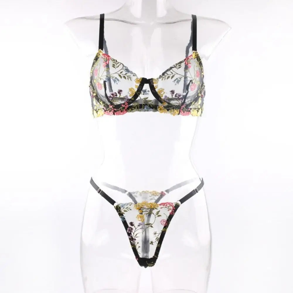 Floral lingerie set on a mannequin against a white background