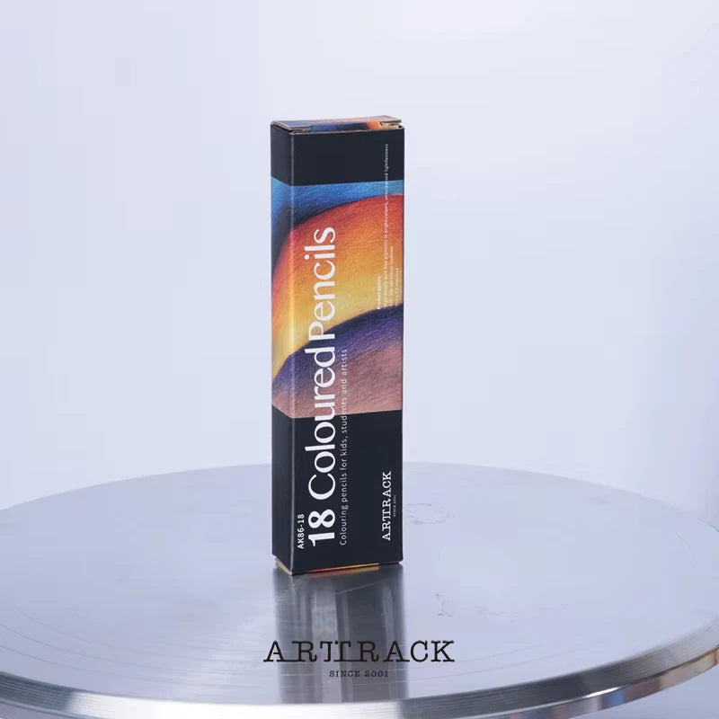 Box of Artrack coloured pencils on a reflective surface with a white background. Set crayons de couleur bois 12-72 pcs, colorés et vibrants pour dessin, écriture, fournitures scolaires et art. Qualité pro UK FTF Market.