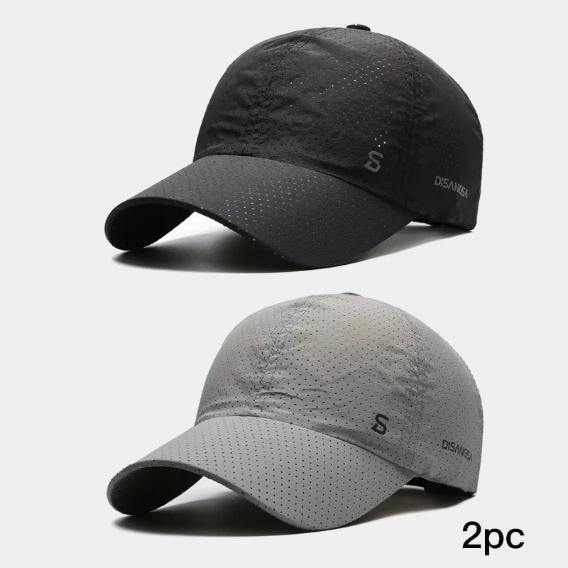 Two black and gray baseball caps on a white background