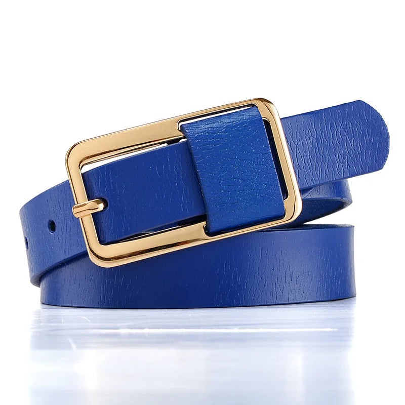Blue leather belt with a gold buckle on a white background. Women’s wide leather belt with cinched design and metal buckle. Enhances waistline for shirts, dresses, suits. Trendy, durable, UK fashion accessory.
